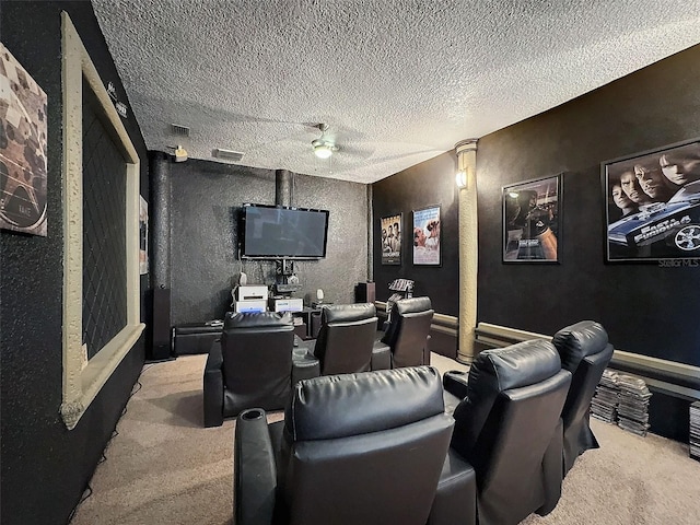 carpeted home theater featuring a textured ceiling