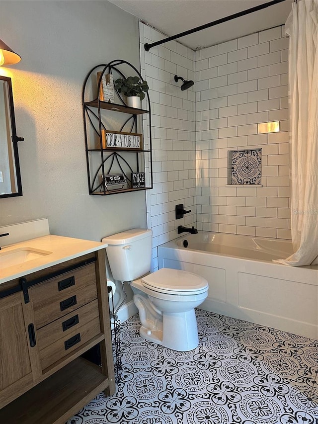 bathroom featuring toilet, shower / bath combo, vanity, and tile patterned floors