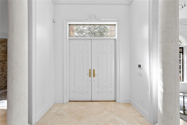 foyer with light tile patterned floors