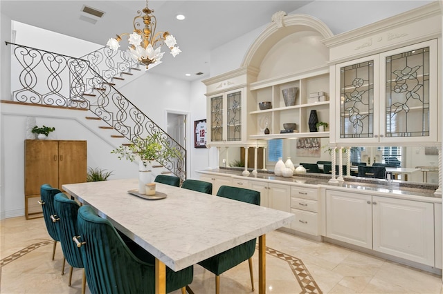 dining room featuring a notable chandelier