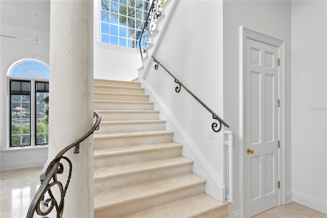 stairs with a towering ceiling