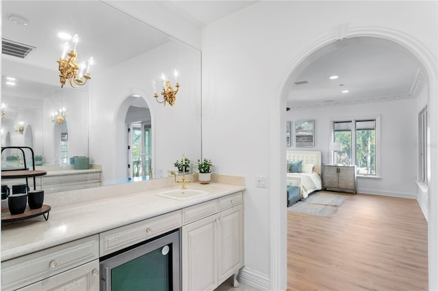 bathroom featuring hardwood / wood-style flooring and vanity