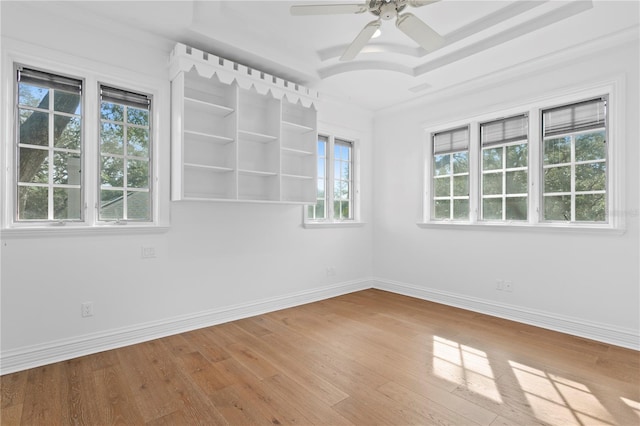 unfurnished room featuring hardwood / wood-style flooring and ceiling fan