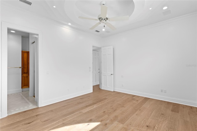 interior space featuring crown molding, ceiling fan, and light hardwood / wood-style flooring