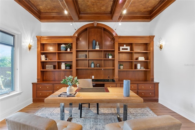 home office featuring hardwood / wood-style flooring, coffered ceiling, crown molding, and beamed ceiling