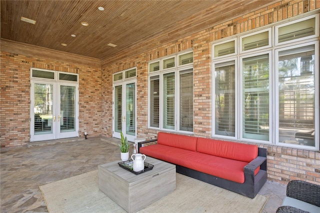 view of patio / terrace with an outdoor hangout area and french doors