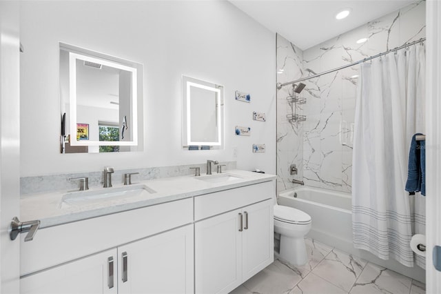 bathroom with toilet, marble finish floor, shower / bathtub combination with curtain, and a sink