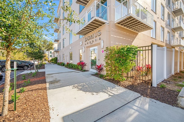 644 3rd Ave S Unit 305, Saint Petersburg, FL 33701 - view of property exterior with stucco siding and a residential view