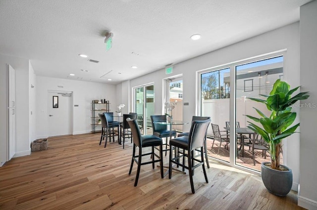 644 3rd Ave S Unit 305, Saint Petersburg, FL 33701 - dining room with wood finished floors and recessed lighting