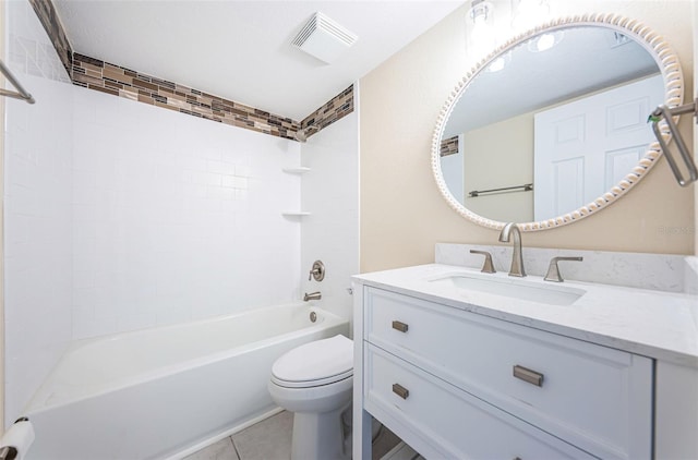 full bathroom with tiled shower / bath combo, vanity, tile patterned floors, and toilet