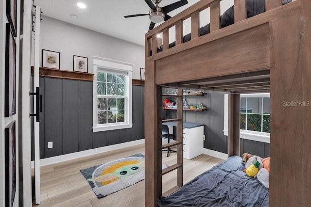 bedroom featuring recessed lighting, baseboards, and wood finished floors