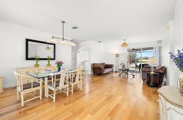 dining space featuring light hardwood / wood-style flooring