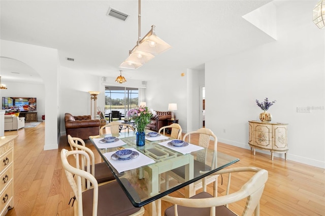 dining space featuring hardwood / wood-style floors