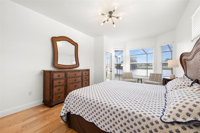 bedroom with light hardwood / wood-style flooring