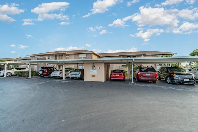 view of parking with a carport