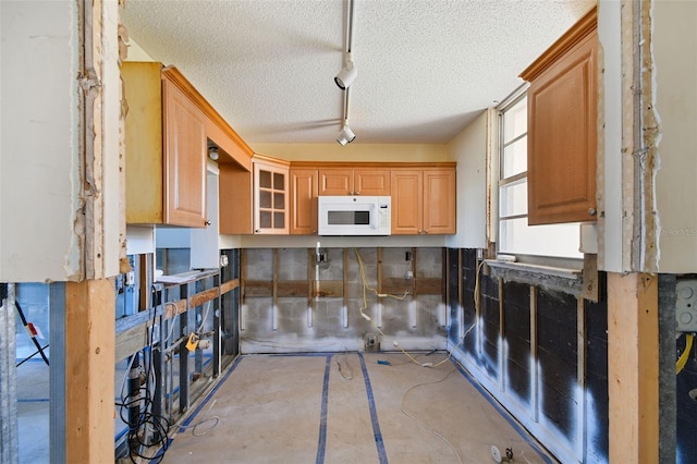 kitchen featuring a textured ceiling