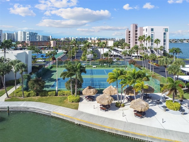 birds eye view of property with a water view