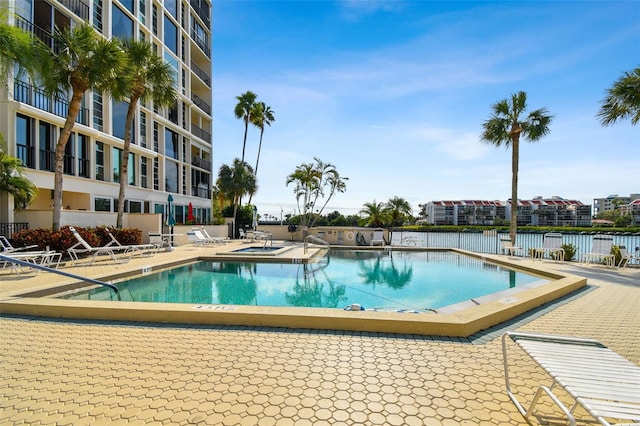 view of pool featuring a patio area