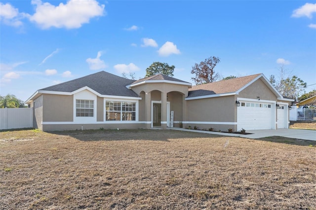 view of front of property featuring a garage