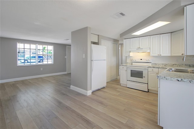 kitchen with white cabinetry, white appliances, sink, and light wood-type flooring