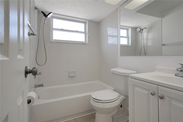 full bathroom with tiled shower / bath combo, vanity, a textured ceiling, tile patterned floors, and toilet