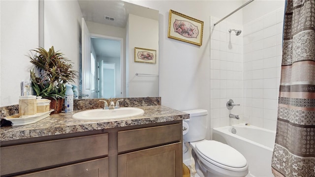 full bathroom featuring vanity, toilet, and shower / bath combo with shower curtain