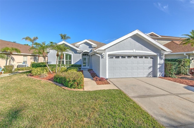 single story home featuring a garage and a front lawn