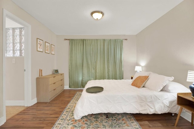 bedroom featuring hardwood / wood-style floors