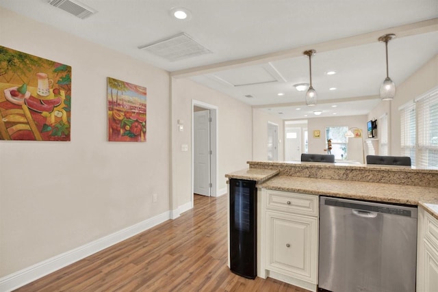 kitchen with wine cooler, decorative light fixtures, light hardwood / wood-style flooring, dishwasher, and light stone countertops