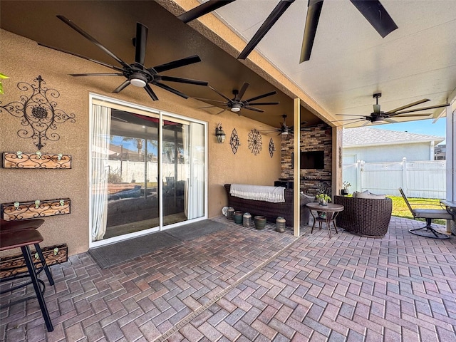 view of patio / terrace featuring a fireplace