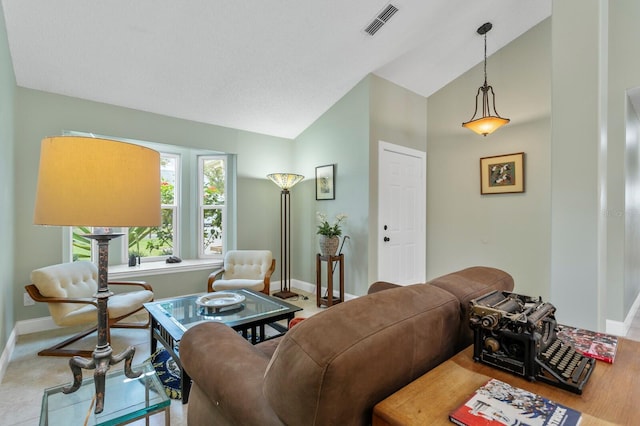 living room with lofted ceiling