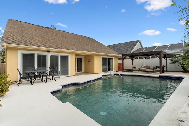 view of swimming pool featuring a gazebo and a patio