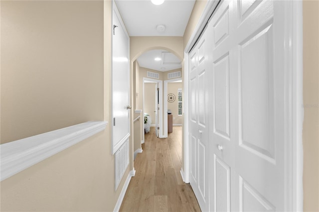 corridor featuring light hardwood / wood-style flooring