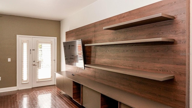 mudroom with dark wood-type flooring