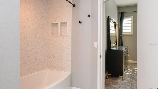 bathroom with shower / bathtub combination