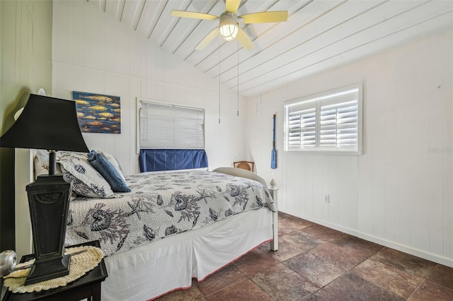 bedroom with lofted ceiling and ceiling fan