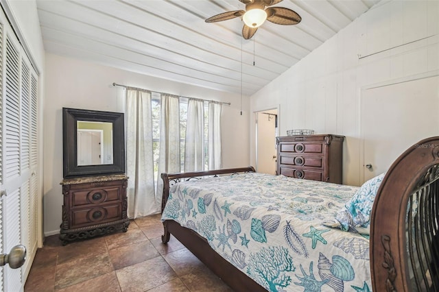 bedroom with lofted ceiling, wooden ceiling, a closet, and ceiling fan