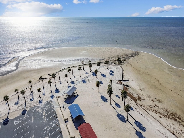 bird's eye view featuring a water view and a view of the beach