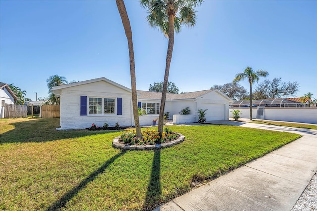 single story home with a front lawn and a garage