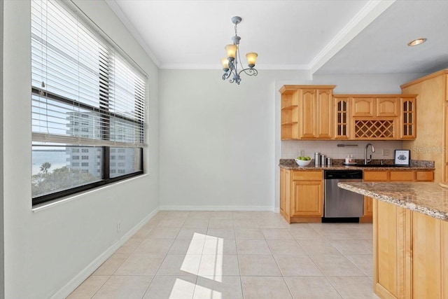 kitchen featuring light stone counters, decorative light fixtures, light tile patterned floors, ornamental molding, and dishwasher