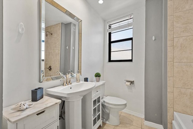 bathroom featuring tile patterned floors and toilet