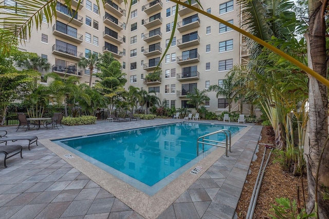 view of swimming pool featuring a patio