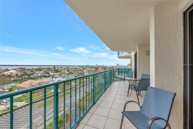 balcony featuring a water view