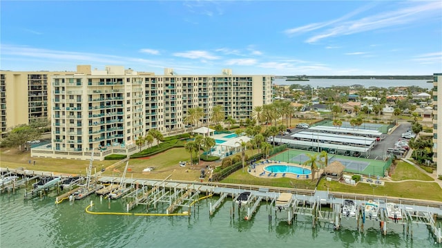 birds eye view of property with a water view