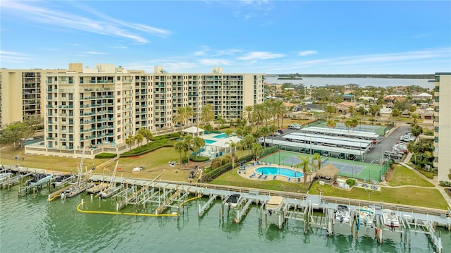 birds eye view of property with a water view