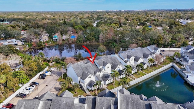 drone / aerial view featuring a water view