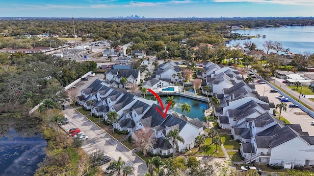 birds eye view of property featuring a water view