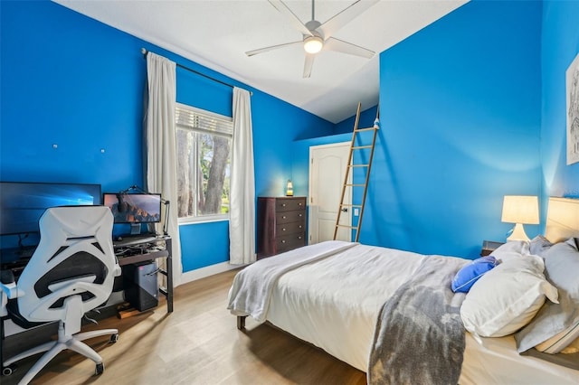 bedroom with hardwood / wood-style flooring and ceiling fan