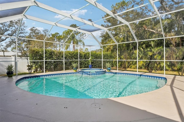 view of pool featuring an in ground hot tub, a lanai, and a patio