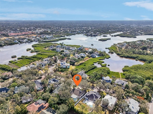 bird's eye view with a water view and a residential view